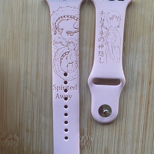 Anime themed, enchanting and magical characters engraved design on a silicone watch band compatible with Apple Watch and Galaxy Watch .