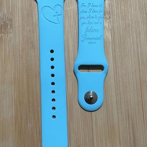 Bible verse themed engraved design on a silicone watch band compatible with Apple Watch and Galaxy Watch .