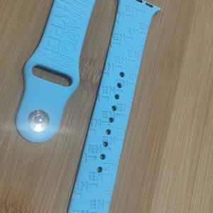 Enhypen k pop bias themed engraved design on a silicone watch band compatible with Apple Watch and Samsung Galaxy Watch