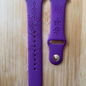 Anime themed, demon boy character engraved design on a silicone watch band compatible with Apple Watch and Galaxy Watch .
