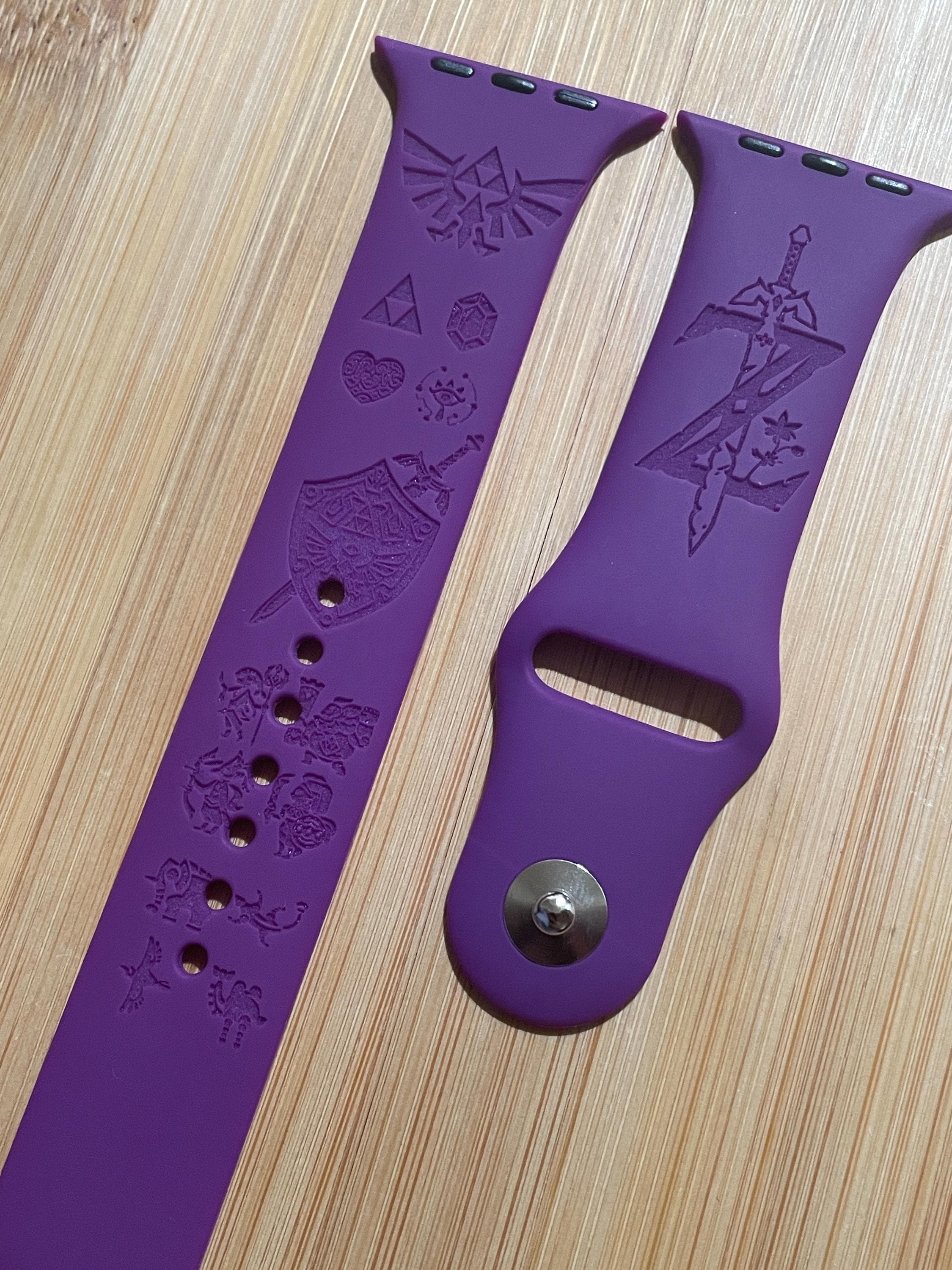 Video Game themed engraved design on a silicone watch band compatible with Apple Watch and Galaxy Watch .