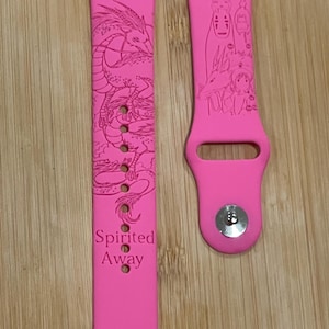 Anime themed, enchanting and magical characters engraved design on a silicone watch band compatible with Apple Watch and Galaxy Watch .