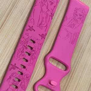 Anime themed, demon girl character engraved design on a silicone watch band compatible with Apple Watch and Galaxy Watch .