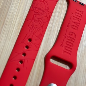 Anime themed, Tokyo creature engraved design on a silicone watch band compatible with Apple Watch and Galaxy Watch .