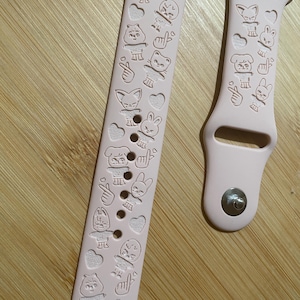 Stray Kids SKZOO k pop themed engraved design on a silicone watch band compatible with Apple Watch and Samsung Galaxy Watch