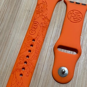 Anime dragon themed engraved design on a silicone watch band compatible with Apple Watch and Galaxy Watch .