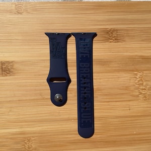 Sports themed. Baseball  team Los Angeles Dodgers engraved design on a silicone watch band compatible with Apple Watch and Galaxy Watch .