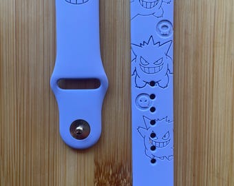 Anime themed ghost poison type character engraved design on a silicone watch band compatible with Apple Watch and Galaxy Watch .