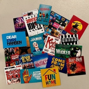 May include: A collection of colourful Broadway show posters, including 'Dear Evan Hansen', 'Rent', 'School of Rock', 'Wicked', 'Waitress', 'Fun Home', 'Come From Away', 'Jagged Little Pill', 'American Idiot', 'Heathers', 'Kinky Boots', 'Beetlejuice', 'Bat Out of Hell', 'Miss Saigon', and 'Six'.