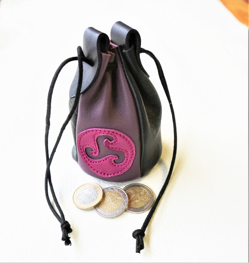 Stock exchange for dice or leather wallet with triskell