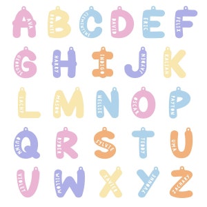 May include: A set of 26 colorful, personalized alphabet letter charms with names printed on each letter. The letters are in a variety of pastel colors, including pink, blue, yellow, and orange. Each letter has a hole at the top for attaching to a keychain or other item.