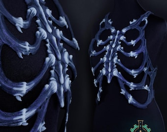 Dragonbone ribcage in black/white with purple/blue glitter (silicone)