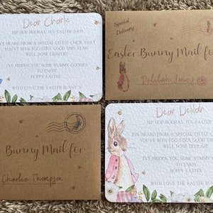 May include: Two Easter bunny mail envelopes with a bunny rabbit illustration and the text "Special Delivery Easter Bunny Mail for" and the name of the recipient. The envelopes are decorated with flowers and a stamp.