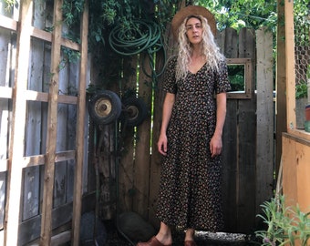 Vintage 90-talsjumpsuit med vida ben och blommig design – mjuk, bekväm och stilren jumpsuit