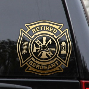 May include: Gold firefighter decal with a black background. The decal features a firefighter's helmet, axe, ladder, and fire hydrant. The words "Retired Sergeant" are written on the decal.