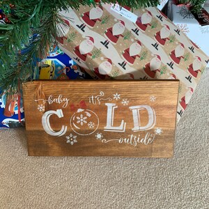 Baby it’s Cold Outside Knotty Pine Sign