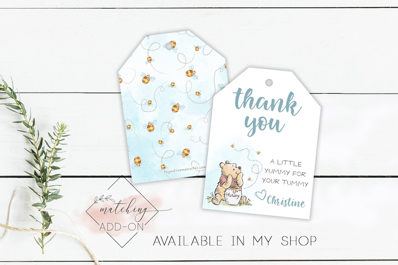 May include: Blue and white thank you tags featuring a Winnie the Pooh illustration and the text "thank you", "a little yummy for your tummy", and "Christine".