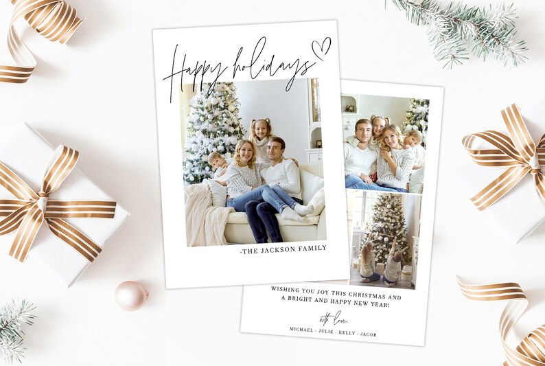 May include: Two white holiday cards with family photos and text. The first card reads "Happy holidays" with a heart and "-THE JACKSON FAMILY." The second card has two photos and text that reads "Wishing you joy this Christmas and a bright and happy new year!"