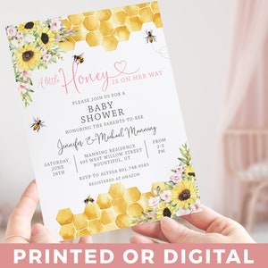 May include: A baby shower invitation with a honeycomb pattern and sunflowers. The text reads "A Little Honey Is On Her Way". The invitation includes the date, time, and location of the shower. RSVP information is also included.