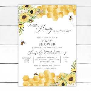 May include: A white baby shower invitation with a honeycomb pattern and sunflowers. The text reads "A Little Honey Is On The Way" and includes the names "Jennifer & Michael Manning".