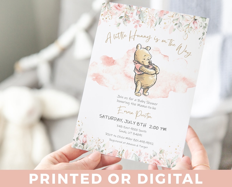May include: A Winnie the Pooh themed baby shower invitation featuring pink and green watercolour flowers. The invitation reads "A Little Hunny is on the Way" and includes the name Emma Preston, the date and time of the shower, and the address. RSVP information and registry details are also included.