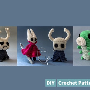 May include: Three crocheted plushies inspired by the video game Hollow Knight. The first plush is a gray and white Knight with a sad expression. The second plush is a white Knight with a red cape. The third plush is a green and white grub.