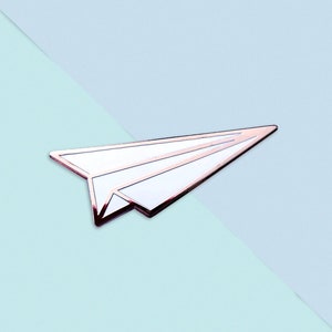 Paper Airplane Punk Pin Super Awesome Custom Soft Enamel Pin. Cute Enamel Pins for your collar, jacket pocket, or tote bag.