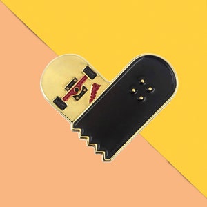 Broken Skateboard Heart Pin - Super Awesome Custom Soft Enamel Pin. Skateboard Deck Pin for your jacket pocket, or tote bag.