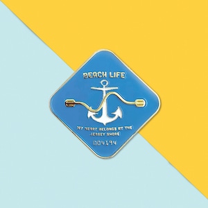 Polished Brass Shore Beach Life Badge Super Awesome Custom Soft Enamel Pin. Cute Enamel Pins for your collar, jacket pocket, or tote bag.
