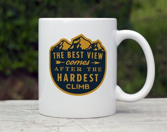La mejor vista viene después de la subida más difícil - Azul - Taza de cerámica - Una taza de café única perfecta o una taza de té personalizada que se puede lavar en lavavajillas