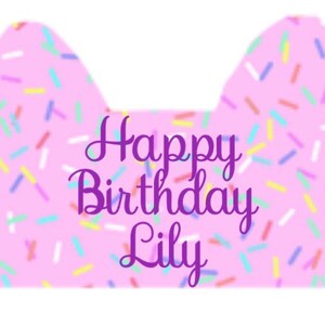 May include: Pink birthday card with a sprinkle pattern and the text "Happy Birthday Lily" in purple.