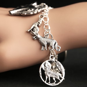 Wolf Bracelet.  Animal Lover Charm Bracelet. Wolves Bracelet. Wolf Jewelry Animal Bracelet. Silver Bracelet. Handmade Jewelry