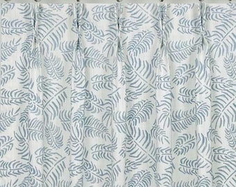 May include: White and blue patterned curtains with a fern leaf design. The curtains are hanging from a silver rod with metal rings. The fabric has a repeating pattern of blue fern leaves on a white background.