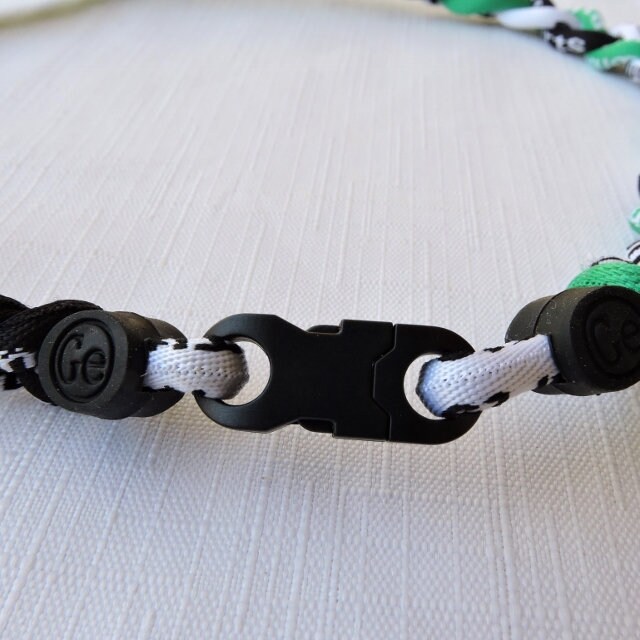 Woven titanium sports necklace green, black and white sports accessory