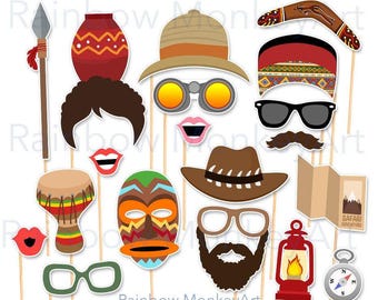 May include: A collection of safari-themed photo booth props on sticks, including a spear, clay pot, pith helmet, binoculars, boomerang, patterned hat, sunglasses, mustache, drum, tribal mask, cowboy hat, beard, lantern, compass, and a map.