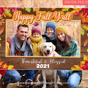 May include: A digital photo booth prop with a wooden background and fall leaves. The text "Happy Fall Y'all" is at the top, and "Thankful & Blessed 2021" is at the bottom. A family and dog are in the photo frame.