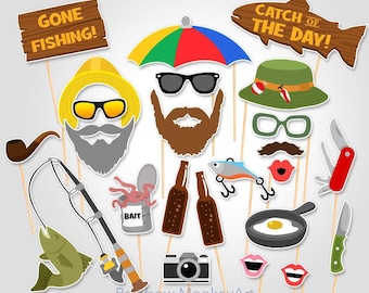 May include: A collection of fishing-themed photo booth props on sticks, including signs reading GONE FISHING and CATCH OF THE DAY, a yellow hat, a colorful umbrella, sunglasses, beards, a fishing rod, a fish, bait, beer bottles, a camera, and a pan.