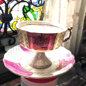 Royal Crown Antique IridescentTeacup and Saucer  -  55/905