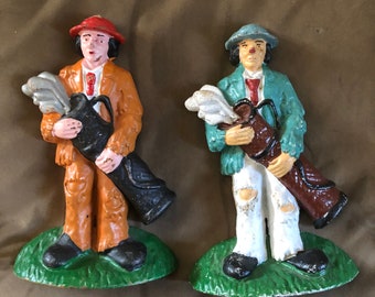 Two Vintage Cast Iron Golf Clown Caddy Doorstops or Bookends
