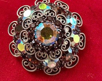 Broche vintage Aurora Boreal – Broche de filigrana dorada con volantes