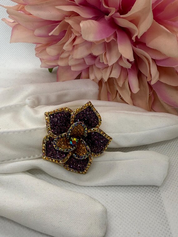 Butler and Wilson Crystal Flower Ring: Purple Ora… - image 1