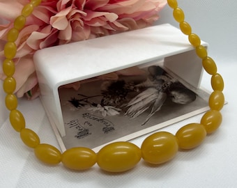 Vintage gele bakelieten kralenketting uit de jaren 1950