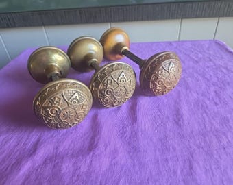 Three (3) Sets of Antique Norwalk H-2200 brass door knobs with Spindles and set screws. Six (6) knobs total.