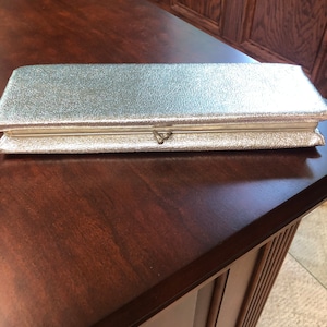 Elegant Silver Clutch Purse, great for a wedding or any event, perfect size for phone and makeup!  11 1/2&quot; x  4 1/2 x 1 1/2&quot;, black interior