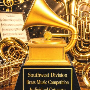 May include: A gold-colored trophy featuring a gramophone horn atop a square base. The black plaque on the front reads: Southwest Division Brass Music Competition Individual Category. The trophy is surrounded by various brass musical instruments.
