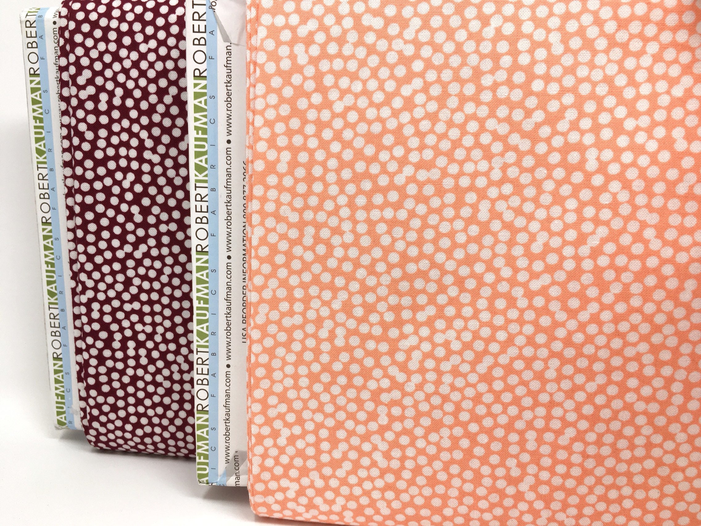 Coral polka dot cotton fabric Coral polka dot printed cotton by the