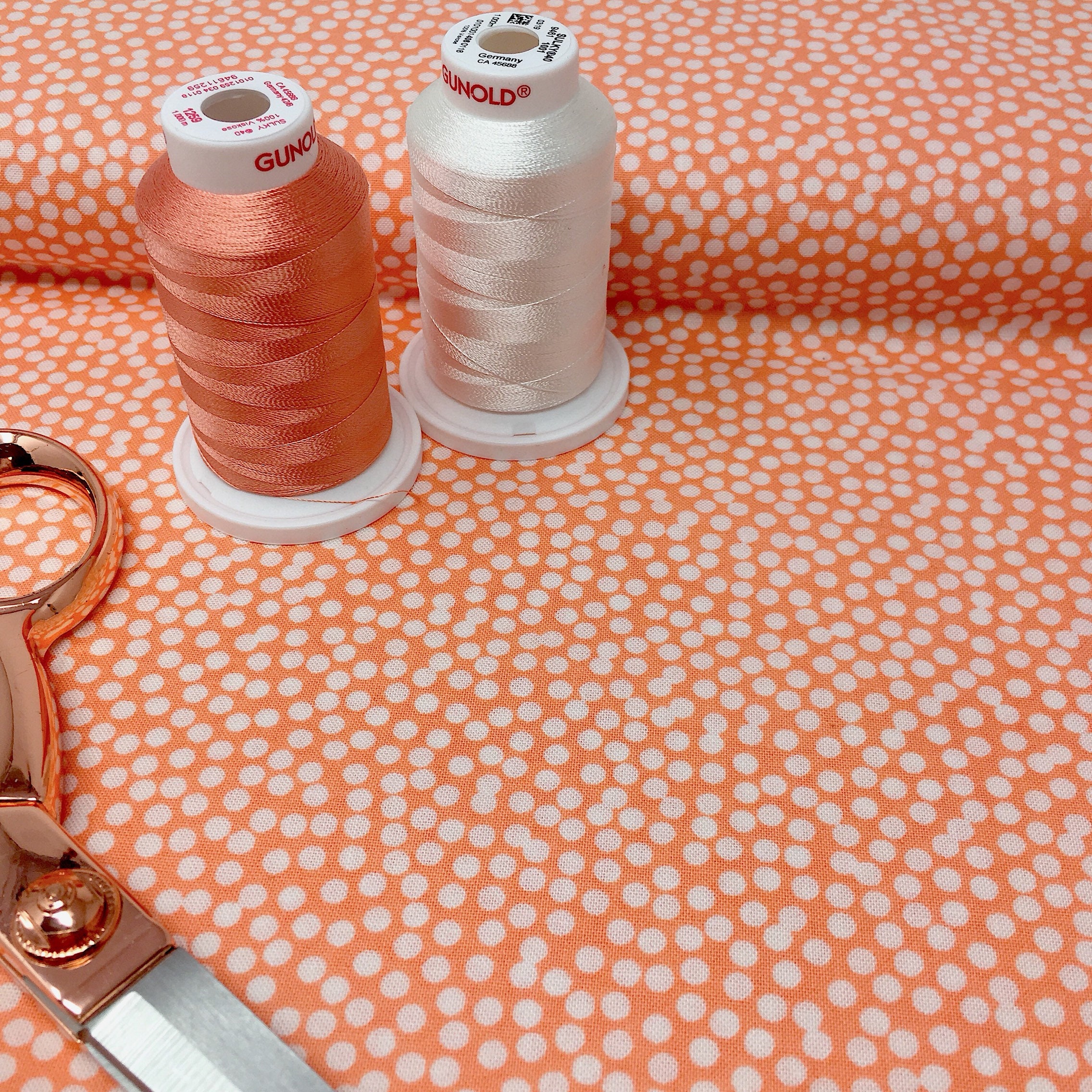 Coral polka dot cotton fabric Coral polka dot printed cotton by the
