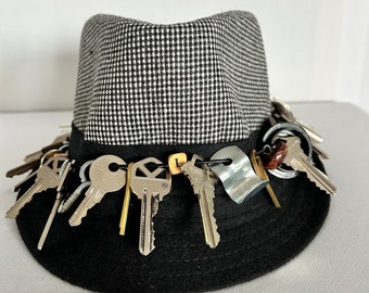 All the Places I’ve Lived and Worked Keys Fedora Size 7-1/4, with Upcycled Buttons and Hardware.