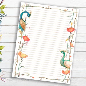 May include: Lined stationery paper with a watercolor peacock and floral design. The paper features a white background with gold lines for writing. The peacock is in shades of blue, green, and brown, with orange and yellow flowers.