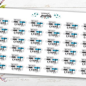 May include: A sheet of 20 word count stickers with a blue and black pen design. The stickers say "Word Count:" in black text.